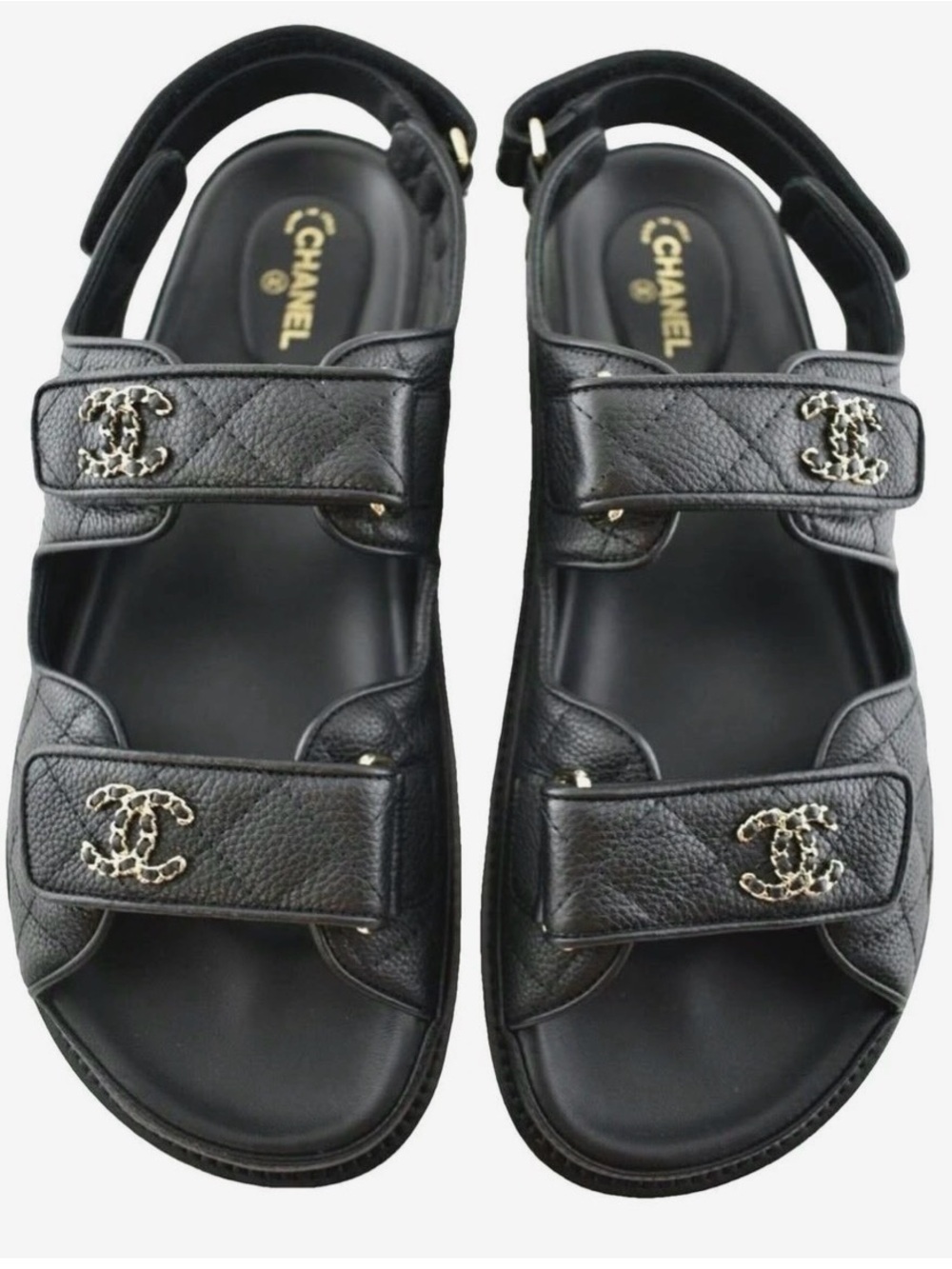 CHANEL Dad Black Leather Logo Strap Sandals with Gold CC Hardware.